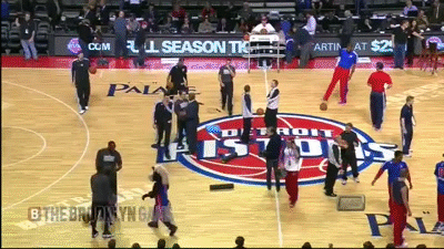Funny: Nets Players Jump Pistons Mascot